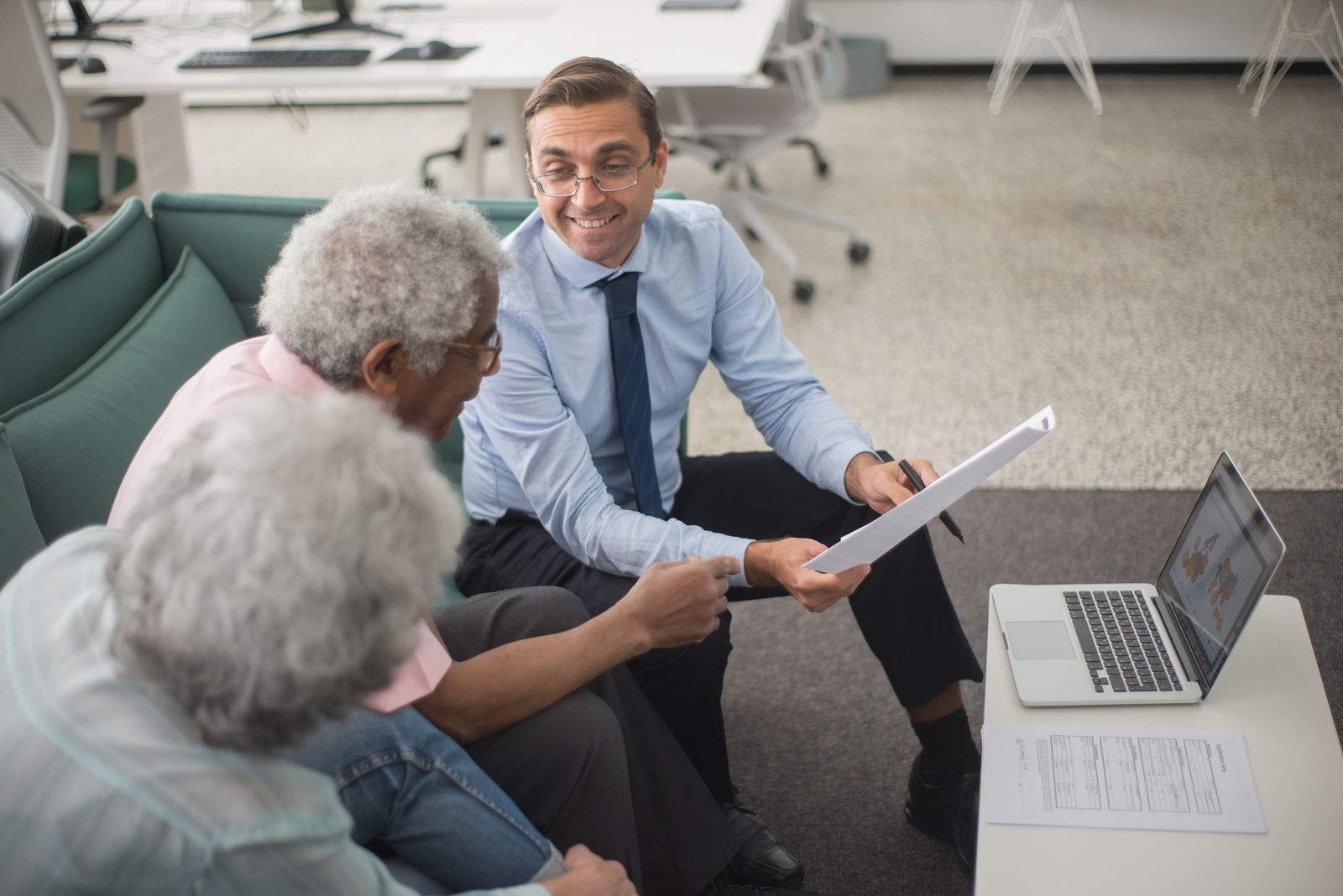 An Evergreen advisor reviewing plan options with retired clients